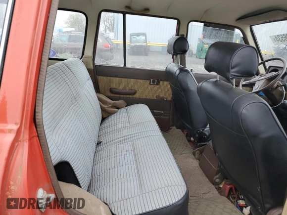 1984 Toyota Land Cruiser z VIN JT3FJ60G7E1114123, wystawiony jako Copart lot #82696534 z przebiegiem 217 999 mil mil oraz Czysty tytuł • Clean title. Historia ofert i sprzedaży dostępna na DreamBid. Obrazek 11.