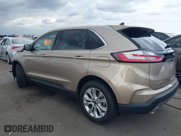 2020 Ford Edge Titanium with VIN 2FMPK3K98LBB41063, listed as a IAAI auction lot 42204966 with 40,808 mi miles and . Bid and sale history available at DreamBid. Image 3.