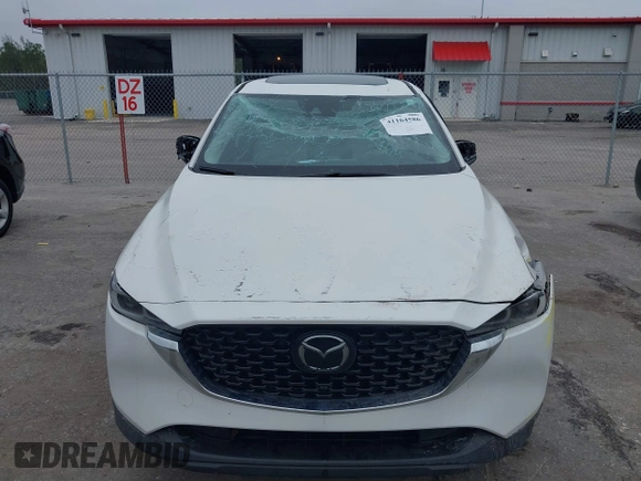 2023 Mazda CX-5 2.5 S Premium Package with VIN JM3KFBDM1P0126787, listed as a IAAI auction lot 41164586 with 12,076 mi miles. Bid and sale history available at carsss.com. Image 6.