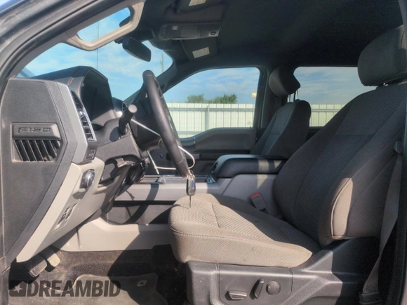 2019 Ford F-150 XL with VIN 1FTEW1E53KFB57102, listed as a Copart auction lot 61633055 with 86,949 mi miles and Salvage title. Bid and sale history available at DreamBid. Image 7.