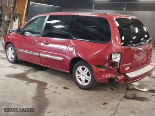 2002 Ford Windstar Wagon SE with VIN 2FMZA52442BB60882, listed as a IAAI auction lot 41621529 with 136,753 mi miles. Bid and sale history available at carsss.com. Image 3.