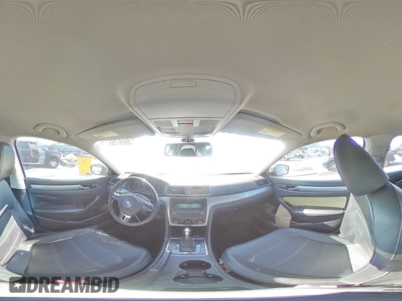 2014 Volkswagen Passat Wolfsburg Edition with VIN 1VWAS7A30EC074232, listed as a Copart auction lot 86975554 with 197,060 mi miles and Salvage title. Bid and sale history available at DreamBid. Image 13.