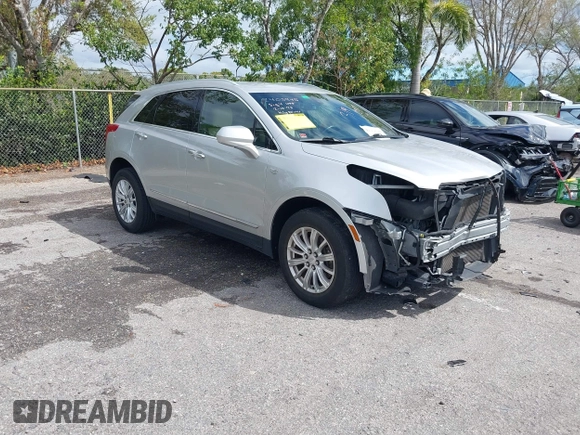 2019 Cadillac XT5 FWD z VIN 1GYKNARSXKZ242727, wystawiony jako IAAI lot #41669220 z przebiegiem 62 812 mil mil oraz . Historia ofert i sprzedaży dostępna na DreamBid. Obrazek 1.