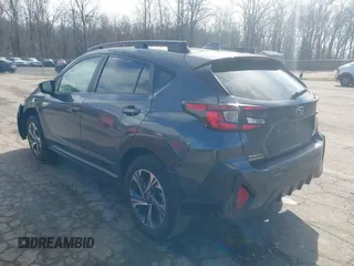 2024 Subaru Crosstrek Premium z VIN JF2GUADC3RH204109, wystawiony jako IAAI lot #41800147 z przebiegiem 31 619 mil mil oraz . Historia ofert i sprzedaży dostępna na DreamBid. Obrazek 3.
