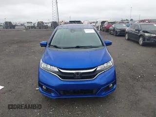 2018 Honda Fit EX with VIN 3HGGK5H88JM718508, listed as a IAAI auction lot 42181101 with 116,446 mi miles and . Bid and sale history available at DreamBid. Image 12.