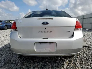 2009 Ford Focus SE with VIN 1FAHP35N09W267059, listed as a Copart auction lot 54155965 with 129,768 mi miles and Salvage Title. Bid and sale history available at carsss.com. Image 6.