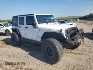 2014 Jeep Wrangler Unlimited Sport with VIN 1C4BJWDG4EL125251, listed as a Copart auction lot 56437605 with 76,867 mi miles and Clean Title. Bid and sale history available at DreamBid. Image 4.