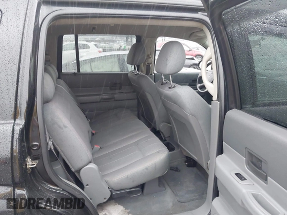 2005 Dodge Durango SXT with VIN 1D4HB38N35F554011, listed as a IAAI auction lot 40873398 with 170,538 mi miles and . Bid and sale history available at DreamBid. Image 8.