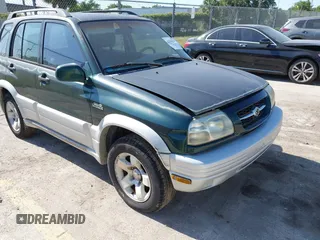 2000 Suzuki Grand Vitara JLX z VIN JS3TD62V9Y4129597, wystawiony jako IAAI lot #42044233 z przebiegiem 174 833 mil mil oraz . Historia ofert i sprzedaży dostępna na DreamBid. Obrazek 1.