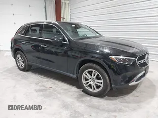 2023 Mercedes-Benz GLC with VIN W1NKM4HB1PU020439, listed as a IAAI auction lot 41676723 with 25,609 mi miles. Bid and sale history available at carsss.com. Image 1.