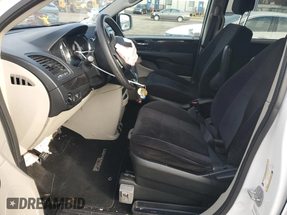 2014 Dodge Grand Caravan SE 30th Anniversary with VIN 2C4RDGBG8ER180968, listed as a Copart auction lot 49465325 with 104,430 mi miles and Salvage Title. Bid and sale history available at DreamBid. Image 7.