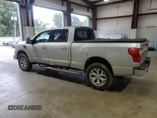 2016 Nissan Titan XD PRO-4X with VIN 1N6BA1F45GN506049, listed as a Copart auction lot 70746074 with 153,093 mi miles and Salvage Title. Bid and sale history available at carsss.com. Image 2.