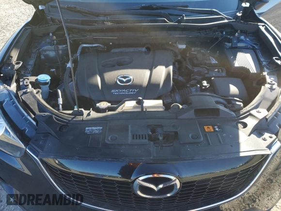 2014 Mazda CX-5 Grand Touring with VIN JM3KE4DY1E0405493, listed as a Copart auction lot 41688915 with 94,970 mi miles and Salvage Title. Bid and sale history available at carsss.com. Image 14.