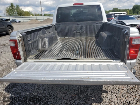 2005 Ford Ranger XL with VIN 1FTYR10D05PB10515, listed as a Copart auction lot 54553865 with 213,057 mi miles and Salvage title. Bid and sale history available at DreamBid. Image 10.