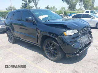 2018 Jeep Grand Cherokee Altitude with VIN 1C4RJEAG2JC428536, listed as a IAAI auction lot 42472960 with 74,631 mi miles and . Bid and sale history available at DreamBid. Image 1.
