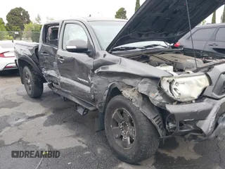 2014 Toyota Tacoma PreRunner with VIN 3TMJU4GN5EM167783, listed as a IAAI auction lot 42031603 with 179,574 mi miles and . Bid and sale history available at DreamBid. Image 6.