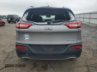 2014 Jeep Cherokee Limited with VIN 1C4PJLDS0EW241327, listed as a Copart auction lot 59440245 with 73,623 mi miles and Salvage title. Bid and sale history available at DreamBid. Image 6.