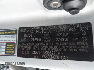 2008 Kia Optima LX z VIN KNAGE123385225909, wystawiony jako IAAI lot #42184219 z przebiegiem 118 300 mil mil oraz . Historia ofert i sprzedaży dostępna na DreamBid. Obrazek 9.