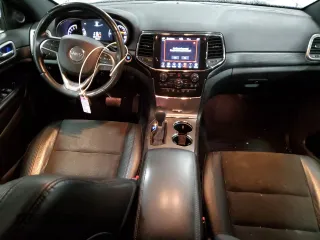 2021 Jeep Grand Cherokee Laredo E with VIN 1C4RJFAG3MC775884, listed as a Copart auction lot 52502325 with 59,368 mi miles and Salvage title. Bid and sale history available at DreamBid. Image 8.