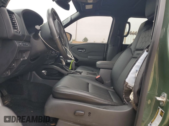 2022 Nissan Frontier Pro-4X z VIN 1N6ED1EKXNN602213, wystawiony jako Copart lot #56967775 z przebiegiem 32 937 mil mil oraz Szkoda całkowita • Salvage title. Historia ofert i sprzedaży dostępna na DreamBid. Obrazek 7.