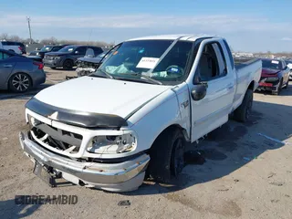 1999 Ford F-150 XL with VIN 1FTRX17L0XKB96416, listed as a IAAI auction lot 41333031 with Not Provided miles. Bid and sale history available at carsss.com. Image 2.