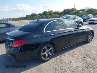 2018 Mercedes-Benz E 300 with VIN WDDZF4JB5JA380872, listed as a IAAI auction lot 42048785 with 94,574 mi miles and . Bid and sale history available at DreamBid. Image 4.