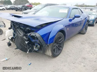 2022 Dodge Challenger R/T Scat Pack with VIN 2C3CDZFJ8NH185721, listed as a IAAI auction lot 40944089 with 27,564 mi miles. Bid and sale history available at carsss.com. Image 2.