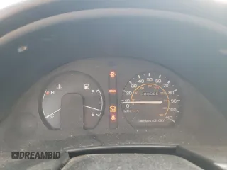 1991 Toyota Tercel z VIN JT2EL46B9M0010781, wystawiony jako Copart lot #71634404 z przebiegiem 88 055 mil mil oraz Tytuł czysty. Historia ofert i sprzedaży dostępna na DreamBid. Obrazek 9.
