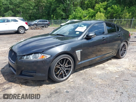 2015 Jaguar XF V6 Portfolio with VIN SAJWA0F74F8U76324, listed as a IAAI auction lot 42158134 with 136,995 mi miles. Bid and sale history available at carsss.com. Image 2.