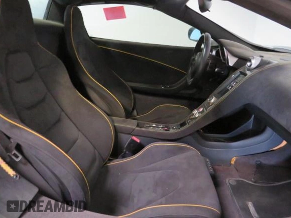 2016 McLaren 650S z VIN SBM11FAA1GW006061, wystawiony jako Copart lot #58605735 z przebiegiem 16 999 mil mil oraz Szkody całkowita. Historia ofert i sprzedaży dostępna na DreamBid. Obrazek 5.