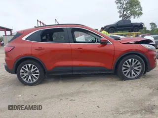 2020 Ford Escape Titanium Hybrid with VIN 1FMCU0DZ1LUB13684, listed as a IAAI auction lot 41629782 with 31,669 mi miles and . Bid and sale history available at DreamBid. Image 13.