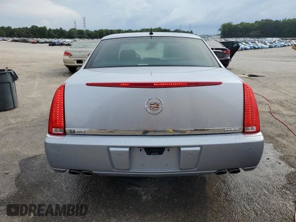 2006 Cadillac DTS 1SC z VIN 1G6KD57Y36U186630, wystawiony jako Copart lot #60792235 z przebiegiem 137 670 mil mil oraz Czysty tytuł • Clean title. Historia ofert i sprzedaży dostępna na DreamBid. Obrazek 6.