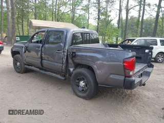 2022 Toyota Tacoma SR with VIN 3TYAX5GN1NT042099, listed as a IAAI auction lot 42081791 with 38,621 mi miles and . Bid and sale history available at DreamBid. Image 3.