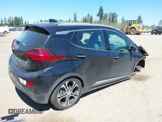 2018 Chevrolet Bolt EV Premier z VIN 1G1FX6S03J4130637, wystawiony jako IAAI lot #42185946 z przebiegiem 39 014 mil mil oraz . Historia ofert i sprzedaży dostępna na DreamBid. Obrazek 4.