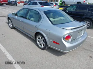 2003 Nissan Maxima SE with VIN JN1DA31D33T513282, listed as a IAAI auction lot 42289710 with 343,973 mi miles and . Bid and sale history available at DreamBid. Image 3.