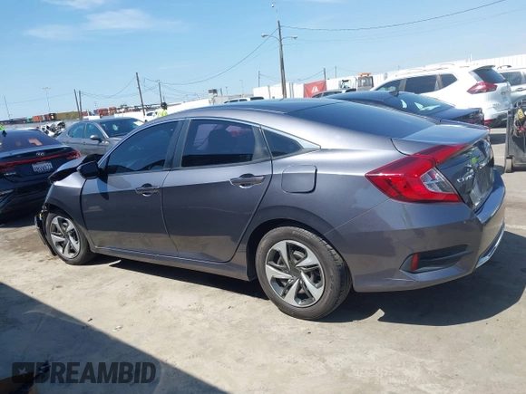 2020 Honda Civic LX with VIN 2HGFC2F67LH551651, listed as a IAAI auction lot 41861966 with 205,619 mi miles and . Bid and sale history available at DreamBid. Image 14.