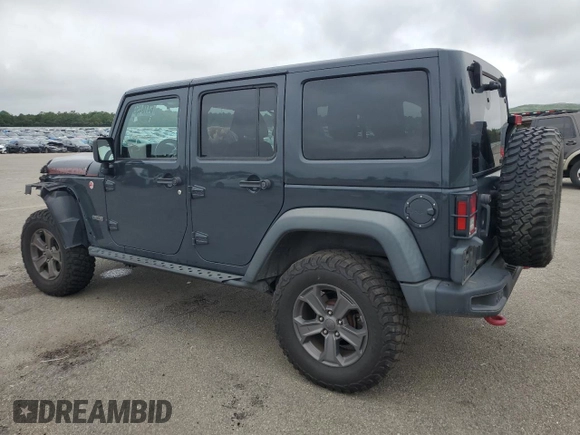 2017 Jeep Wrangler Unlimited Rubicon Recon with VIN 1C4HJWFG3HL729160, listed as a Copart auction lot 64184595 with 78,086 mi miles and Salvage title. Bid and sale history available at DreamBid. Image 2.