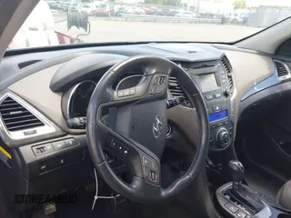 2013 Hyundai Santa Fe Sport z VIN 5XYZUDLA1DG050879, wystawiony jako IAAI lot #42236937 z przebiegiem 124 779 mil mil oraz . Historia ofert i sprzedaży dostępna na DreamBid. Obrazek 17.