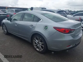 2016 Mazda 6 i Touring with VIN JM1GJ1V57G1434250, listed as a IAAI auction lot 42241857 with 68,011 mi miles and . Bid and sale history available at DreamBid. Image 3.