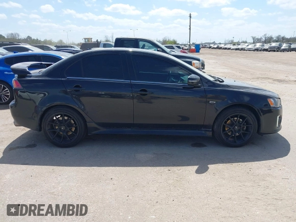 2016 Mitsubishi Lancer GT with VIN JA32U8FW8GU011501, listed as a IAAI auction lot 41779016 with 153,082 mi miles. Bid and sale history available at carsss.com. Image 13.