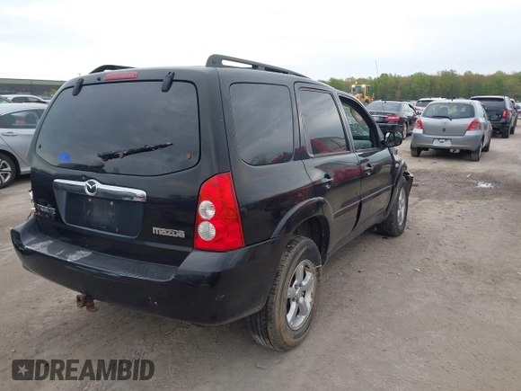 2005 Mazda Tribute S with VIN 4F2YZ96145KM32776, listed as a IAAI auction lot 42159162 with 200,416 mi miles and . Bid and sale history available at DreamBid. Image 4.