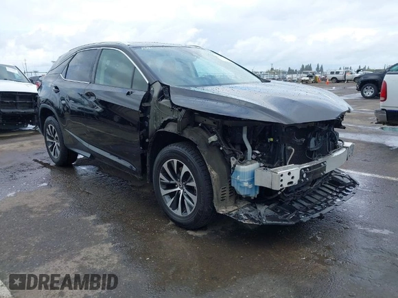 2021 Lexus RX with VIN 2T2HZMDA0MC274146, listed as a IAAI auction lot 41925284 with 67,064 mi miles. Bid and sale history available at carsss.com. Image 1.