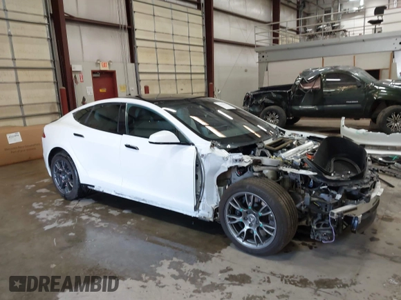 2022 Tesla Model S with VIN 5YJSA1E59NF469984, listed as a IAAI auction lot 42426490 with Not provided miles and . Bid and sale history available at DreamBid. Image 1.
