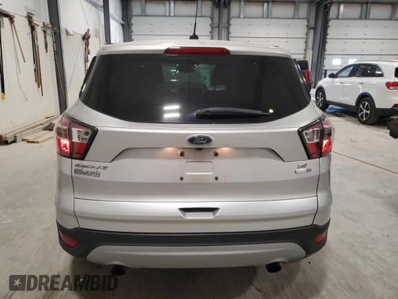 2017 Ford Escape SE z VIN 1FMCU9G90HUA69507, wystawiony jako Copart lot #56594435 z przebiegiem 102 261 mil mil oraz Szkoda całkowita • Salvage title. Historia ofert i sprzedaży dostępna na DreamBid. Obrazek 6.