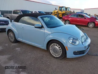 2013 Volkswagen Beetle 2.5L with VIN 3VW5P7AT9DM811542, listed as a IAAI auction lot 41683361 with 79,018 mi miles and . Bid and sale history available at DreamBid. Image 1.