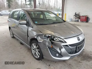 2014 Mazda 5 Touring with VIN JM1CW2CL6E0164146, listed as a IAAI auction lot 41458945 with 157,345 mi miles. Bid and sale history available at carsss.com. Image 1.