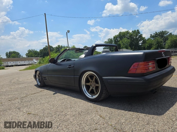 1999 Mercedes-Benz SL 500 with VIN WDBFA68FXXF184548, listed as a Copart auction lot 63814775 with 133,681 mi miles and Clean title. Bid and sale history available at DreamBid. Image 3.