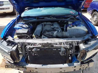 2019 Dodge Charger Scat Pack with VIN 2C3CDXGJ8KH588905, listed as a IAAI auction lot 42211811 with 50,298 mi miles and . Bid and sale history available at carsss.com. Image 10.