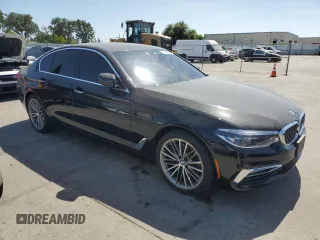 2017 BMW 5 Series 540i xDrive with VIN WBAJE7C36HWA03708, listed as a Copart auction lot 61983685 with 122,082 mi miles and Clean title. Bid and sale history available at DreamBid. Image 4.