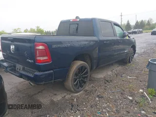 2023 Ram 1500 Laramie with VIN 1C6SRFJT9PN542437, listed as a IAAI auction lot 42256410 with 5 mi miles and . Bid and sale history available at DreamBid. Image 4.